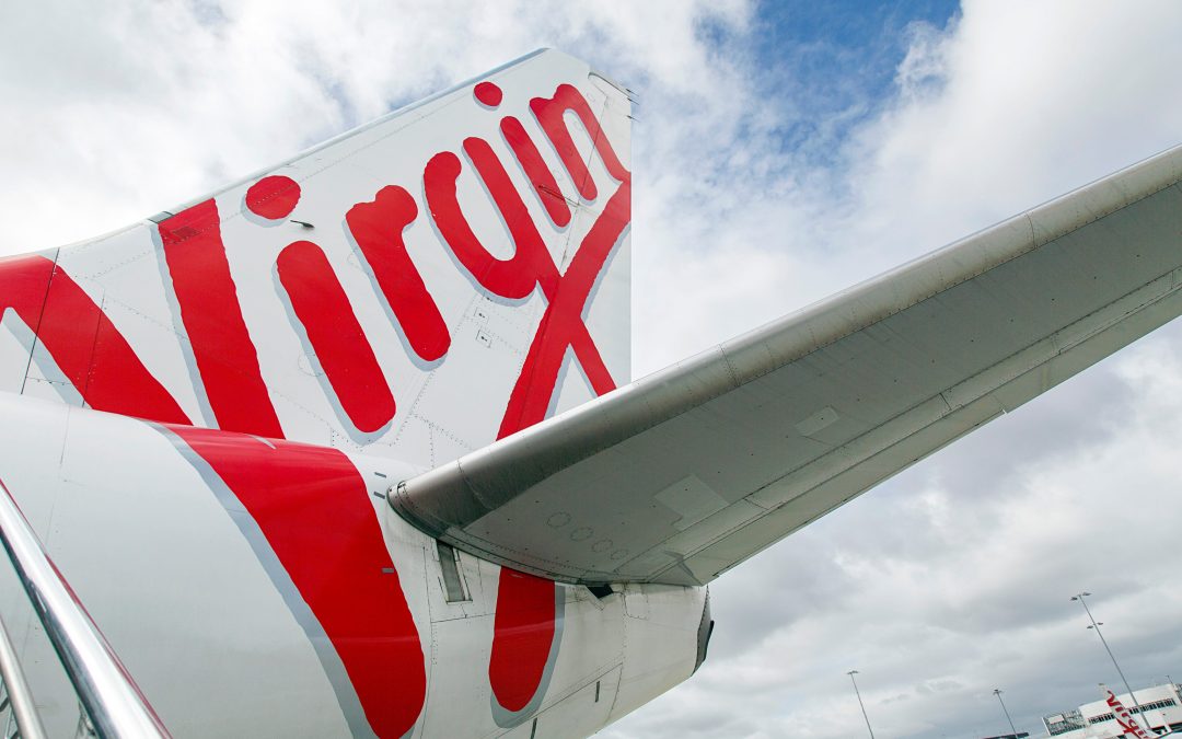 Occidental, Serba Dinamik, Omani Corporates Downgraded; Bain Cap to Buy Virgin Australia
